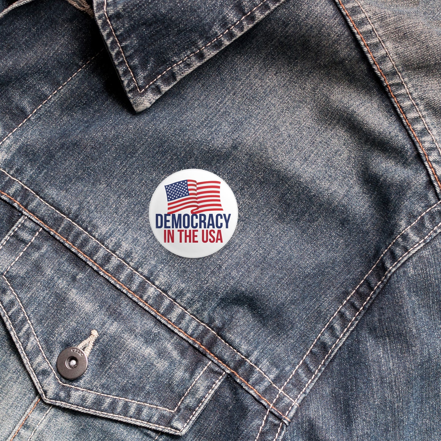 democracy in the usa button on denim jacket